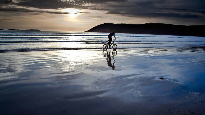Biking on the Beach wallpaper