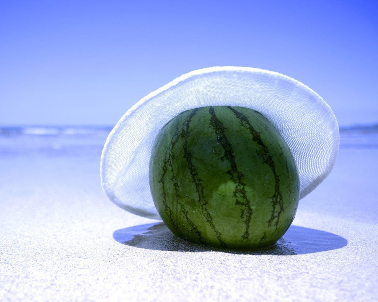 Watermelon on the beach for 1280 x 1024 resolution