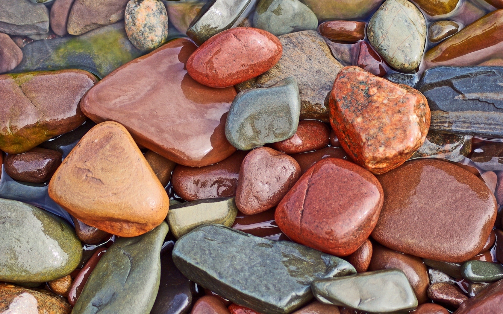Wet colourful rocks for 1680 x 1050 widescreen resolution